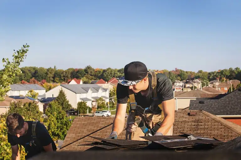 A completed residential shingle roof replacement