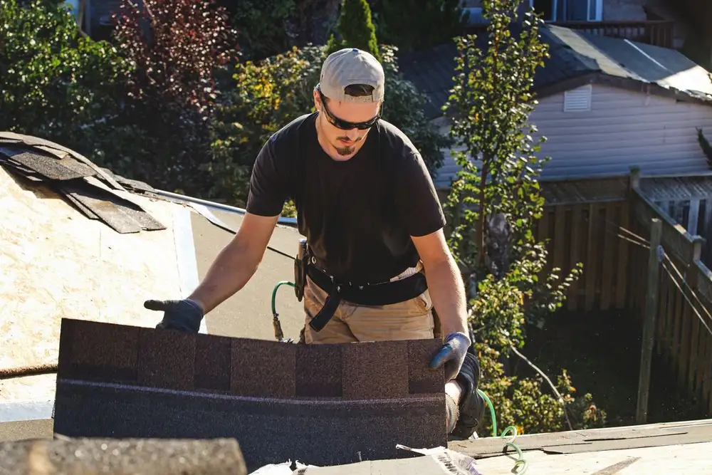 New shingle roof and ridge line on a two-storey home